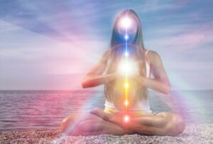 Yoga,meditation,outdoors.,glowing,seven,all,chakra.,woman,sits,in